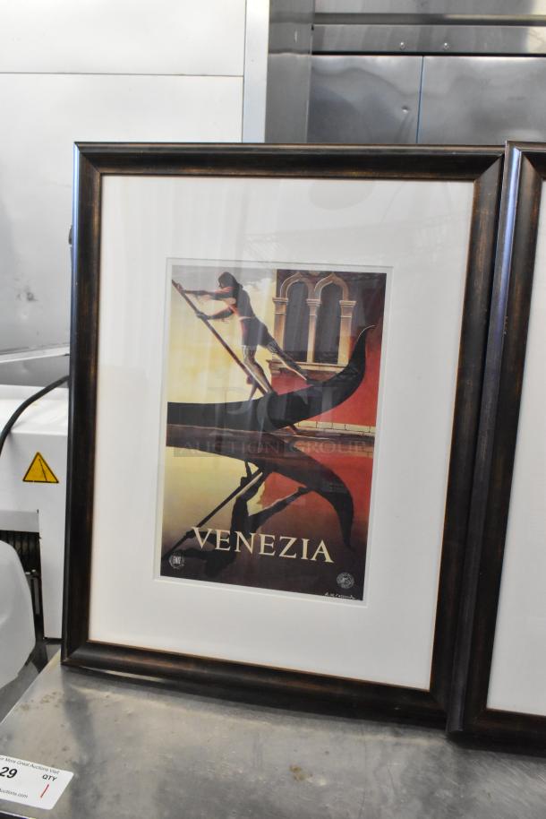 Framed picture titled "Venezia" featuring a gondola scene, dark wood frame, good condition, includes artist's signature.