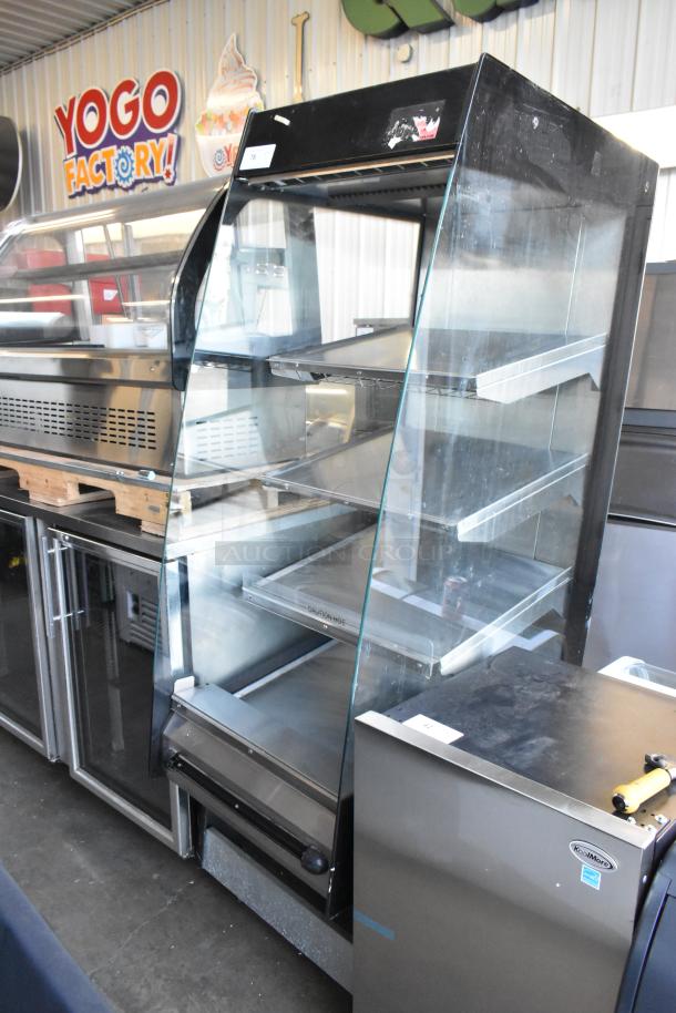 BKI HSS2-4T metal commercial hot merchandiser with multi-shelf design, commercial casters, glass display, 208V, 1 phase.