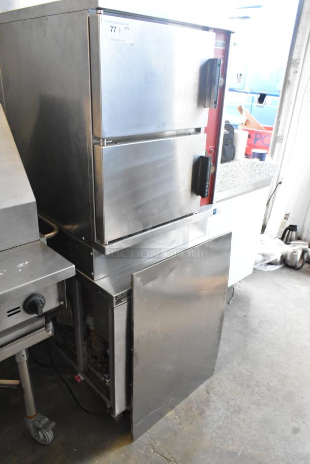 Vulcan VSX24G stainless steel commercial gas steam cabinet, 2 decks, 200,000 BTU, visible model label, in good condition.
