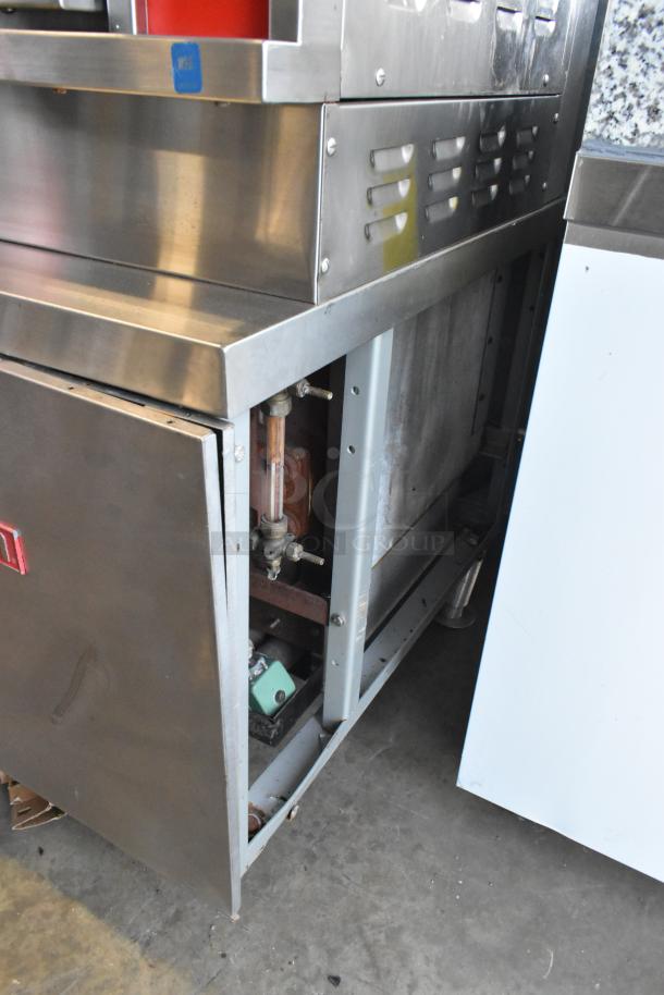 Vulcan VSX24G stainless steel commercial steam cabinet, natural gas, 2 deck, 200,000 BTU, visible gas valve and piping.