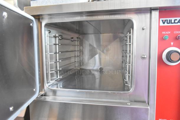 Vulcan VSX24G stainless steel 2-deck steam cabinet, natural gas, 200,000 BTU. Clean interior, control panel visible.