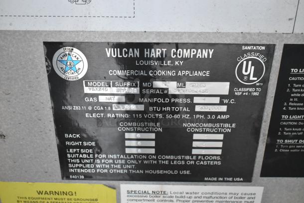 Vulcan VSX24G stainless steel commercial 2 deck steam cabinet label, natural gas, 200,000 BTU, model details visible.