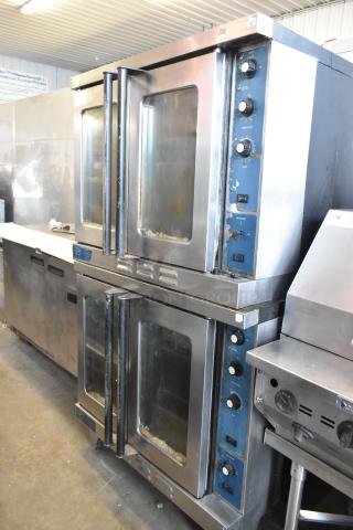 Duke stainless steel full-size convection ovens with view-through doors, metal racks, and thermostatic controls.