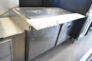 Delfield 4460N-24M stainless steel prep table, dual compartment, commercial use, 115 volts, 1 phase, visible wear.
