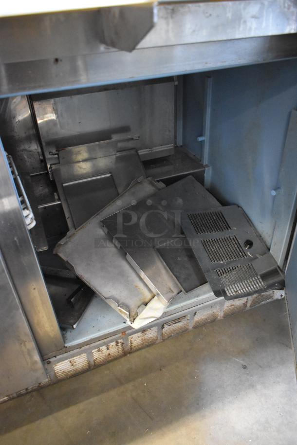 Delfield 4460N-24M stainless steel prep table interior with removable panels. 115V, 1 phase. Used condition.