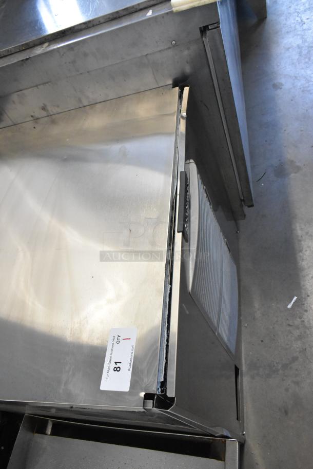 2024 Scotsman MC1030MA-32A stainless steel commercial ice head. Visible auction tag. 208/230V, 1 phase.