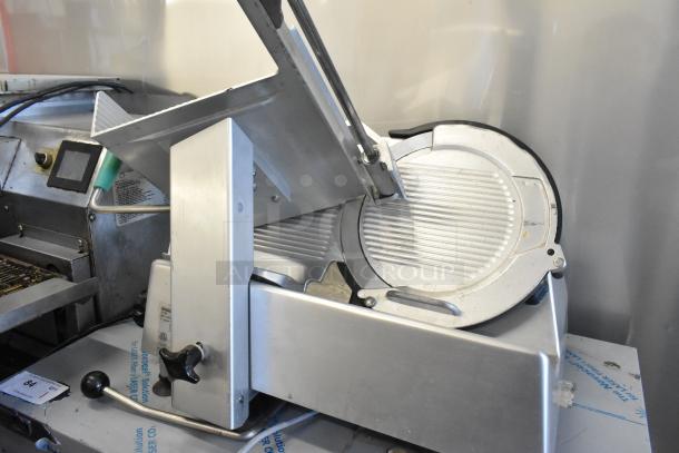 2017 Bizerba GSP H commercial meat slicer, metal construction, used, 120 volts, 1 phase, with manual controls.