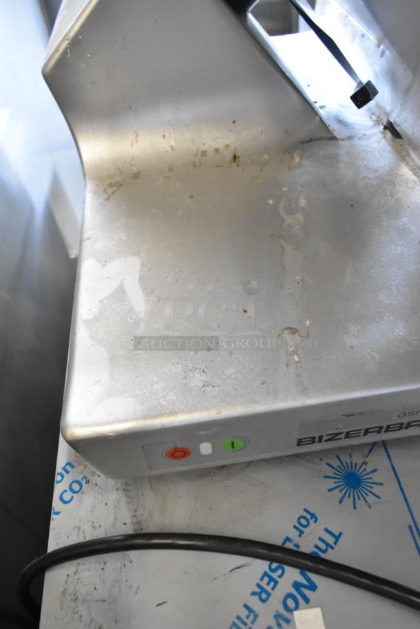 2017 Bizerba GSP H metal commercial meat slicer, slightly worn, 120V, 1-phase, visible power buttons and label with brand.