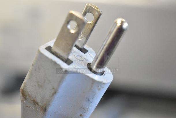 Power plug of a 2017 Bizerba GSP H commercial meat slicer, 120V, 1 phase, showing prongs and minor wear.