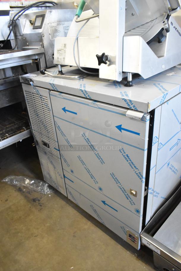 Brand new Perlick DDS36 36" stainless steel beer dispenser, holds two 1/4 kegs, 115 volts, stock photo.