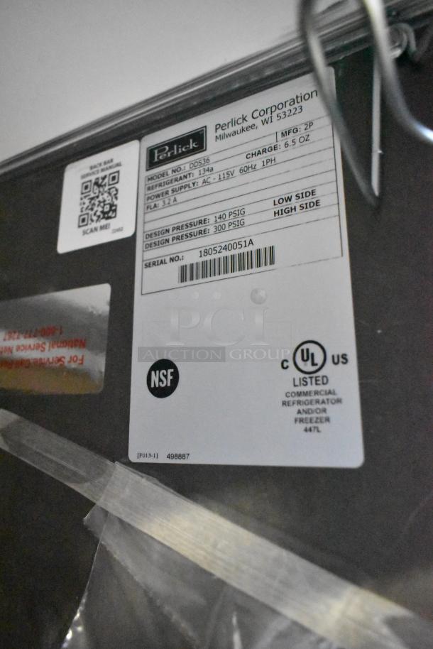 Perlick DDS36 beer dispenser label showing model info, 115V, 1-phase, NSF, UL listed, serial number 1805240051A. Scratch and dent item.