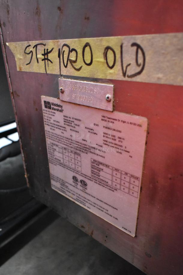 2021 Middleby Marshall PS638G stainless steel conveyor pizza oven, 89,000 BTU, commercial casters, natural gas, labeled ST#1020.