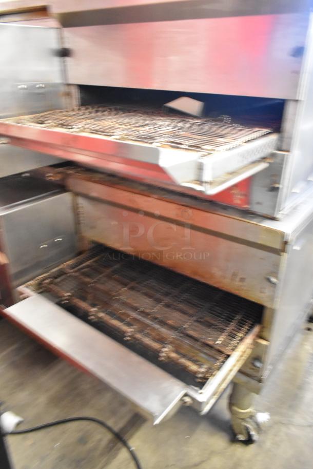 Pair of 2021 Middleby Marshall PS638G stainless steel conveyor pizza ovens. Natural gas, 89,000 BTU, on casters.
