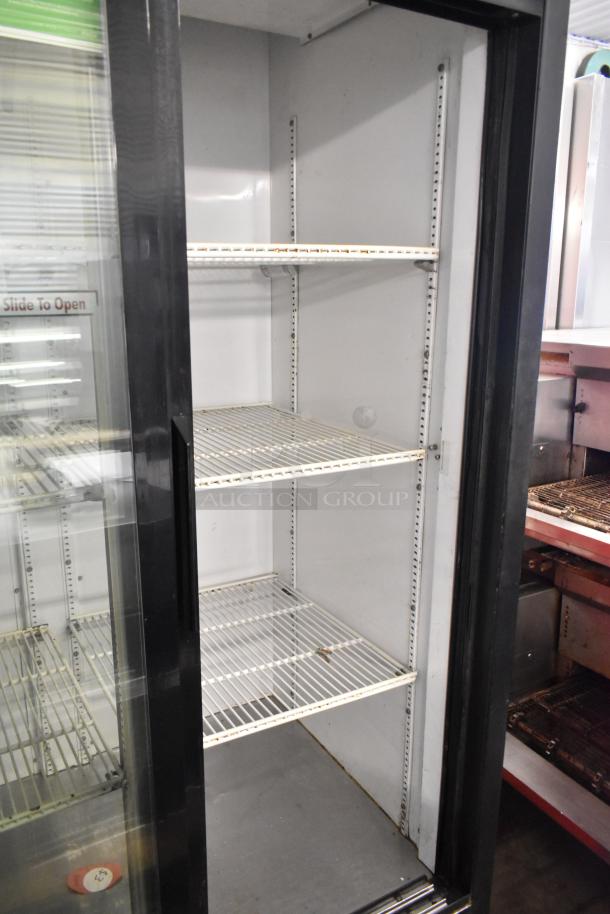 True GDM-37EM commercial 2-door cooler merchandiser, metal construction with poly-coated racks, 115V, 1-phase power.
