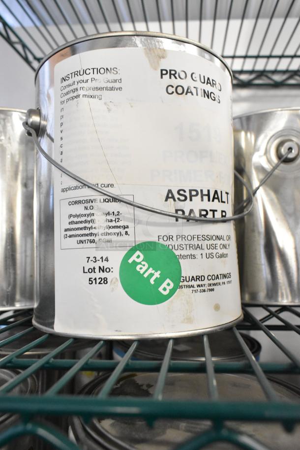 10 Pro Guard chemical cans including 1524-2 Pro Flex Base Coat Blue Part B and Asphalt Part B. Labels indicate professional use.