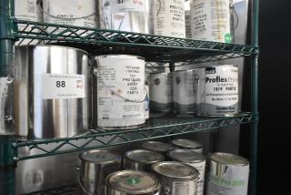 11 Pro Guard chemical cans including Proflex Primer for asphalt roofs and WR Enamel Red, on metal shelves, labeled for auction.