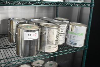8 Pro Guard chemical cans on a shelf, including 9908 Super Pipe Seal Part B, 2407 Epoxy Part A, Pond Pro 2000. Auction lot V-8.