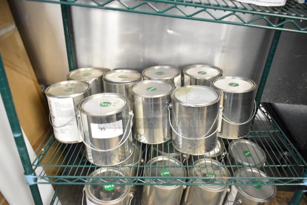 Nine Pro Guard chemical cans including 9908 Super Pipe Seal Part B, on a shelf. Labels indicate "Part B."