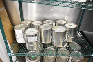 Nine Pro Guard chemical cans including 9908 Super Pipe Seal Part B, on a shelf. Labels indicate "Part B."