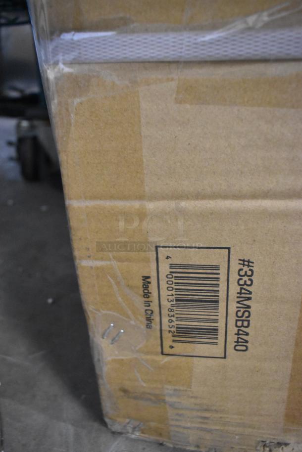 Cardboard box with barcode and "Made in China" label, housing a Galaxy MSB440 440 lb. eye-level mechanical beam scale.