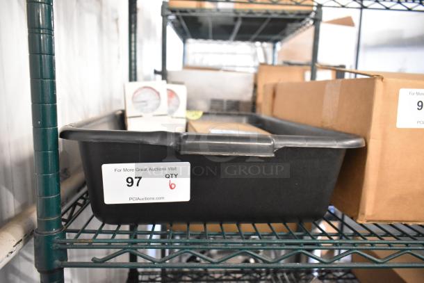 Black plastic bin containing various items, including Hatco AP63-20034F25 black ABS leg and Watts water pressure regulator. Label reads "97 QTY 6".