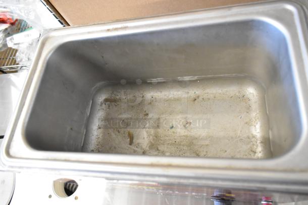 Nemco 6135-SUB stainless steel food warmer, showing inner compartment with visible wear, suitable for commercial use, 120 volts.