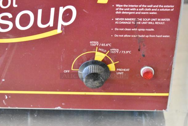 Nemco 6135-SUB stainless steel countertop food warmer, 120 volts, 1 phase, temperature control knob, instructions visible.