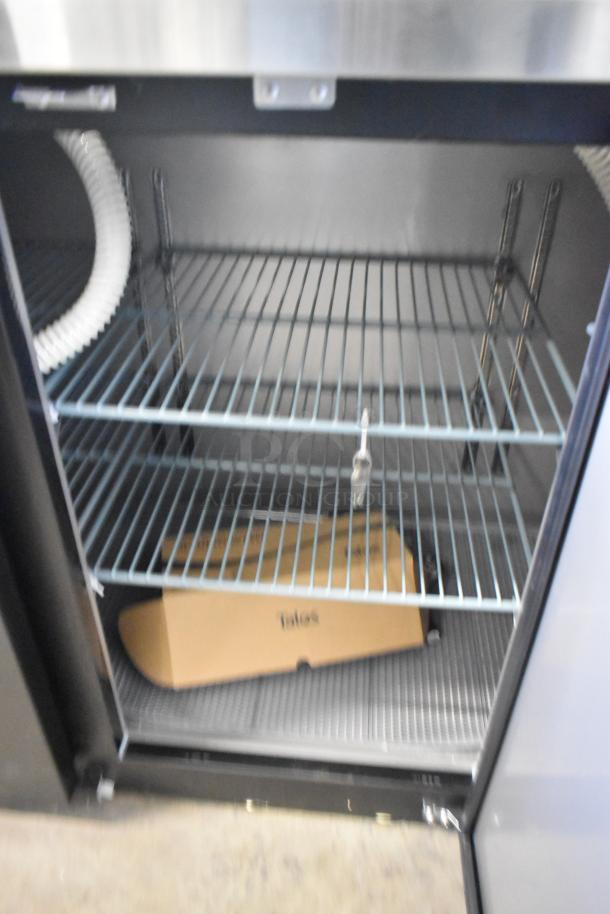 Brand new Avantco 178UDD72HC commercial kegerator interior, black, 3 half-keg capacity, double tap, minor scratches.