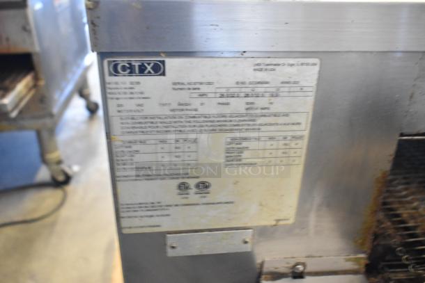 Middleby Marshall CTX DZ33I stainless steel commercial electric conveyor pizza ovens, with labels showing model and specs.
