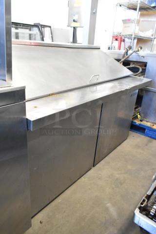 2023 Sir Lawrence SLMPREP-2DW stainless steel prep table. Commercial sandwich/salad use, Bain Marie Mega Top, 115V, 1 phase. Slight wear visible.