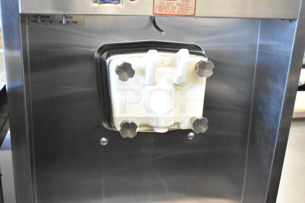 Taylor 8752-27 stainless steel soft serve ice cream machine, floor style, single flavor, on casters. 208/230V, 1 phase.