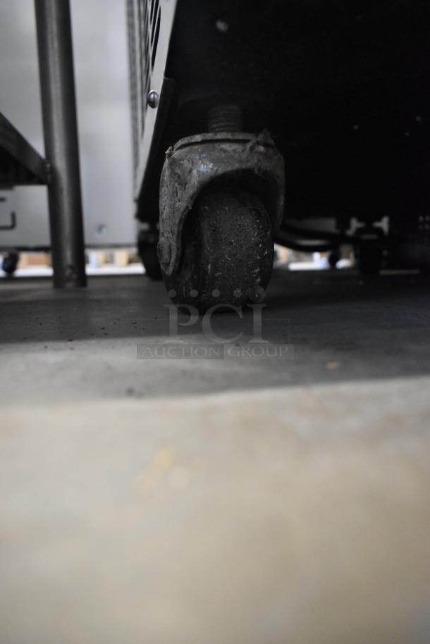 Taylor 8752-27 soft serve machine on caster, stainless steel, single flavor, 208/230V, 1 phase, commercial use.