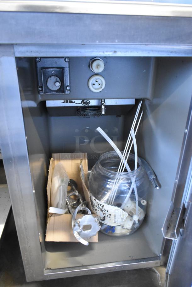 Taylor 8752-27 stainless steel single flavor soft serve ice cream machine, floor model on commercial casters, 208/230V, 1 phase.