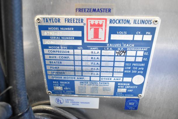 Taylor 8752-27 stainless steel soft serve ice cream machine label, showing model, serial number, and specifications.