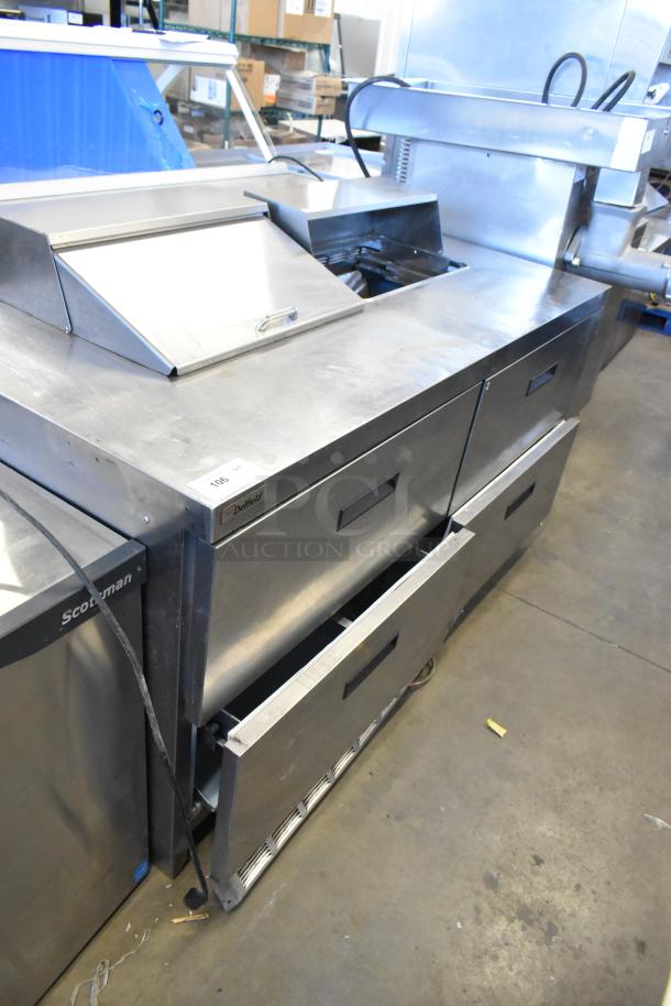Delfield UCD4464N-12-DD5 stainless steel prep table, 4 drawers, missing 1 lid, 115V, 1 phase.