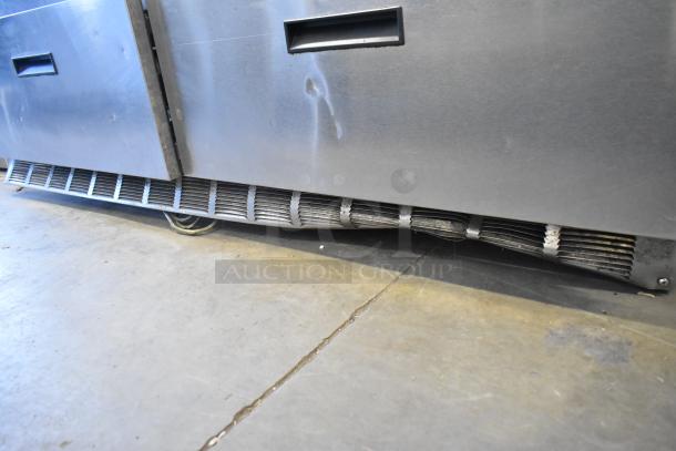 Delfield UCD4464N-12-DD5 stainless steel commercial sandwich prep table with 4 drawers, missing 1 lid, 115V, 1 phase.