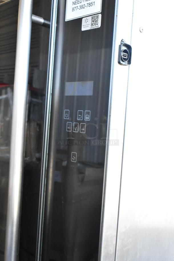 Fri-jado TDR7-P stainless steel rotisserie oven, electric-powered, touch controls, on commercial casters, 208V, 3-phase.