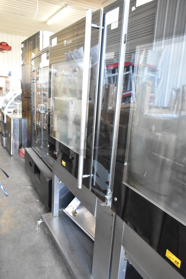 Fri-jado TDR7-P stainless steel rotisserie oven on casters, 208V, 3-phase, commercial use, excellent condition.