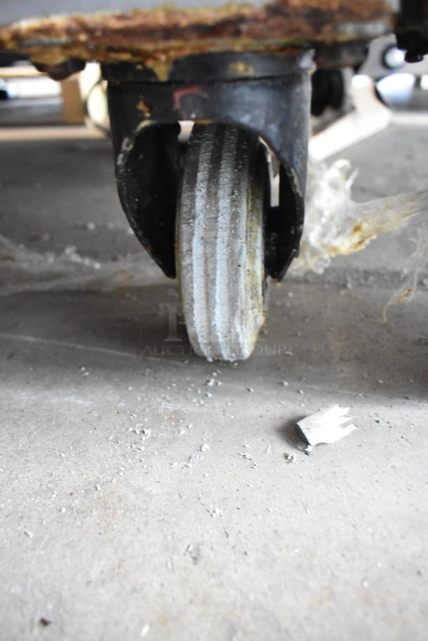 Fri-jado TDR7-P stainless steel rotisserie oven, electric powered, on commercial casters, 208V, 3 phase.