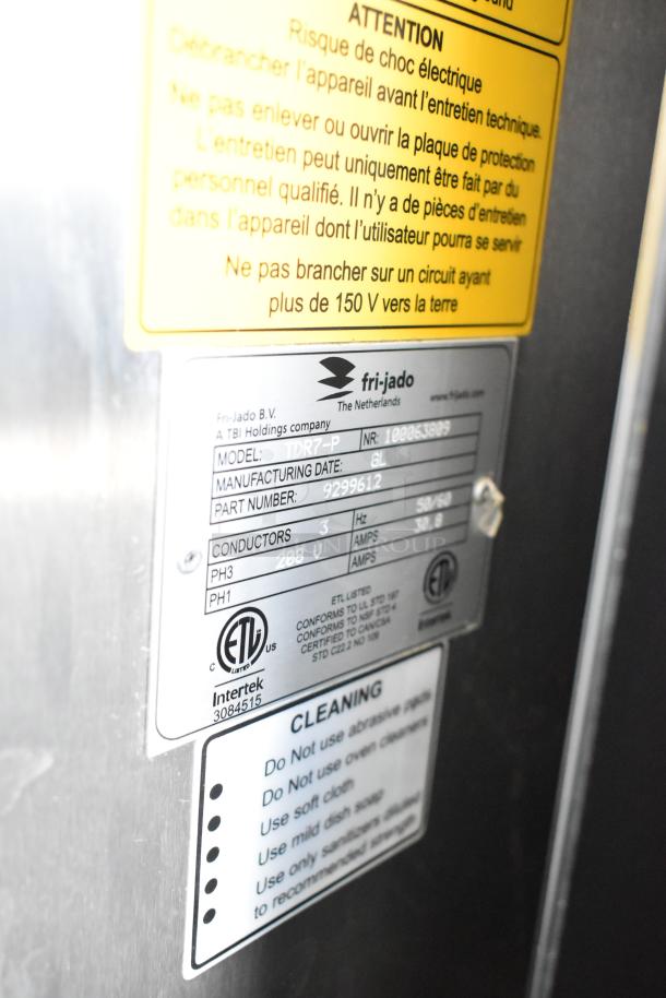 Fri-jado TDR7-P rotisserie oven label, showing model, part number 9299612, 208V 3-phase power specs, and cleaning instructions.