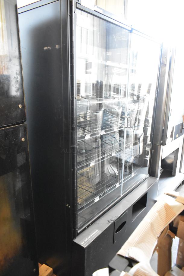 Black Dry Floor Bakery Bagel Donut Merchandiser with glass doors and wire shelves, in good condition.