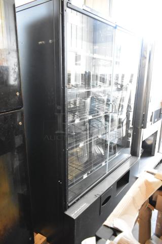 Black Dry Floor Bakery Bagel Donut Merchandiser with glass doors and wire shelves, in good condition.