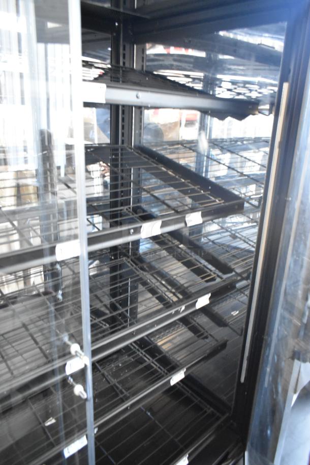 Dry Floor Style Bakery Bagel Donut Merchandiser with multiple shelves, clear glass doors, and metal frame in good condition.