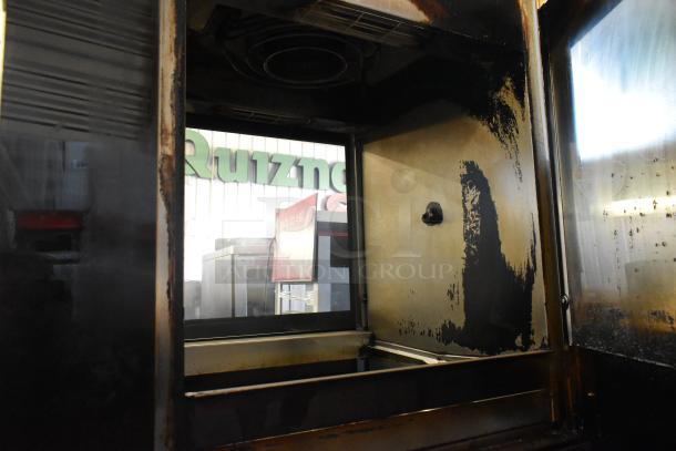 Fri-jado TDR 7 P stainless steel rotisserie oven, commercial-grade, electric, 208V, 3-phase. Visible signs of use.