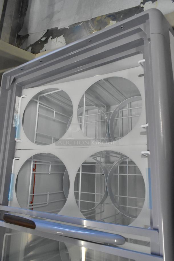 Brand new KoolMore KM-ICD-49SD ice cream dipping cabinet. Metal frame, sliding glass door, fits 8 tubs, 115V, 1 phase.