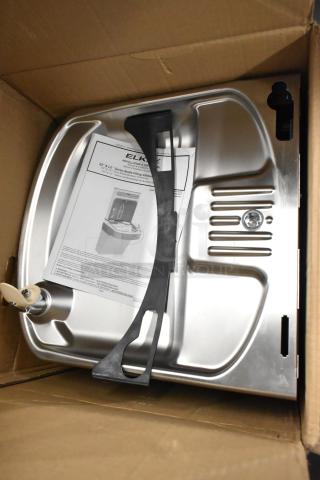 Alt Text: Elkay 438ESDWK stainless steel wall mount water fountain, 115V, 1 phase, new with minor scratches, in original packaging.