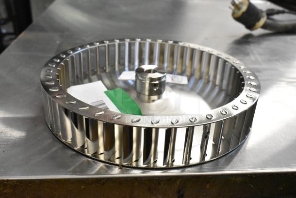 BRAND NEW Garland US Range G02952-01P Blower Wheel Assembly, plated, minor scratches, visible labels, high-quality construction.