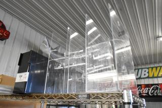 4 new items: Choice Black Countertop Cup and Lid Organizer 176CTO2RS and Clear Poly Dry Ingredient Dispenser on shelf.