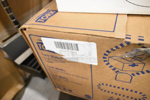 Box of Tork Universal Matic Natural Kraft 1-Ply Paper Towel Roll, 700 Feet/Roll, 6/Case, visible barcode and label.