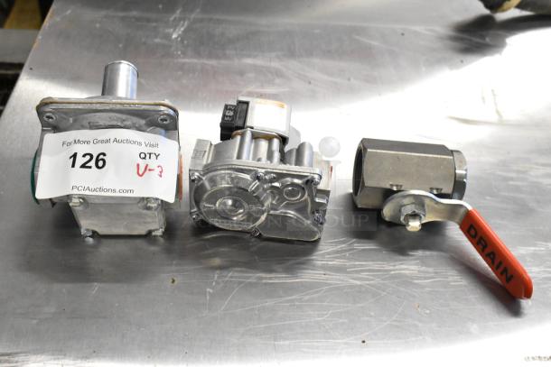 3 brand new scratch and dent items including VR8204A2837 gas valves, labeled with auction tag 126, QTY V-3.